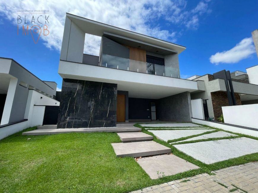 Casa com 4 dormitórios à venda, 270 m² por R$ 1.930.000 - Condomínio Ouro Ville - Taubaté/SP
