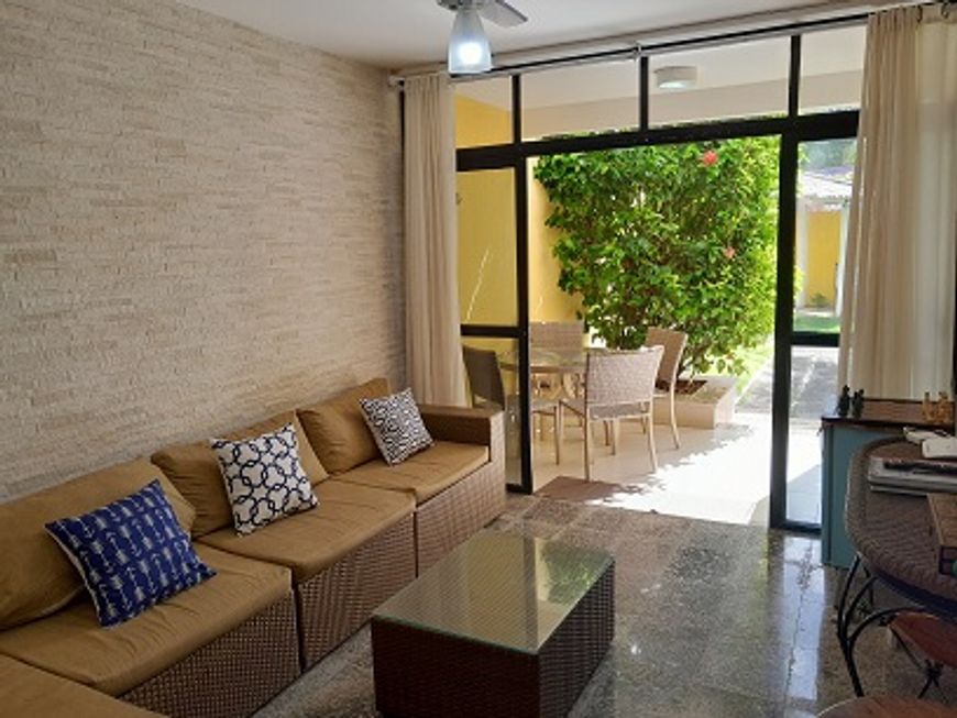 Apartamento em Village frente mar