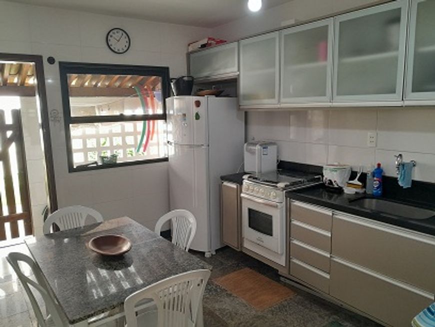 Apartamento em Village frente mar