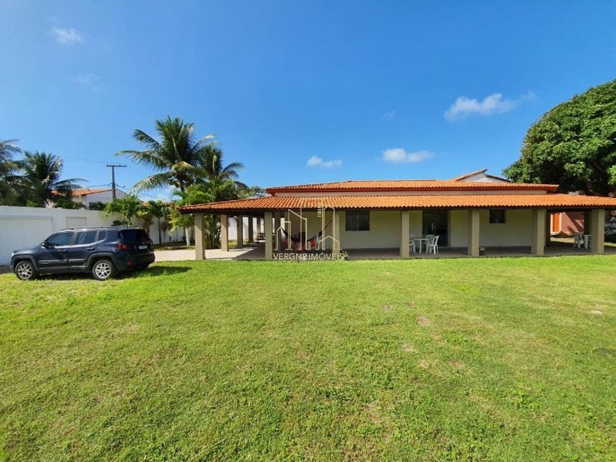 Excelente casa com três quartos área gourmet com piscina e churrasqueira a venda em Arembepe