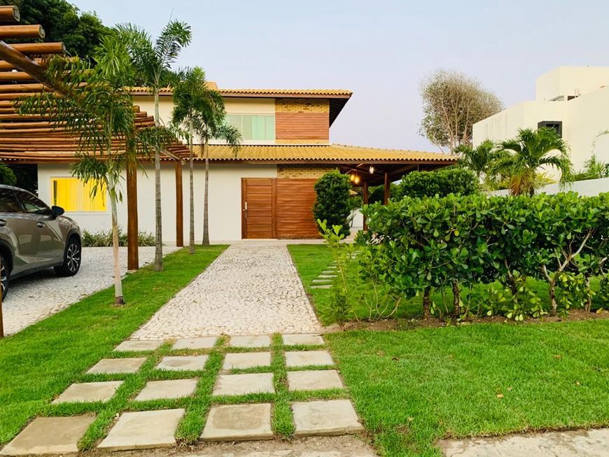 Casa para venda ou locação com 4/4 em condomínio- Busca vida.