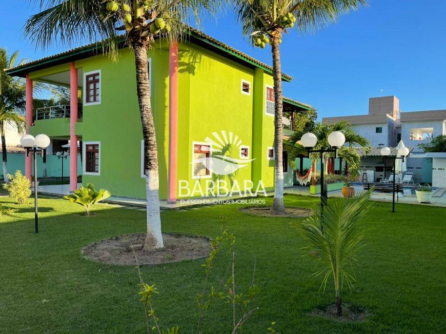 Magnífica casa 7/4 Barra do Jacuípe - Condomínio com acesso á praia privativa e Rio Jacuípe.