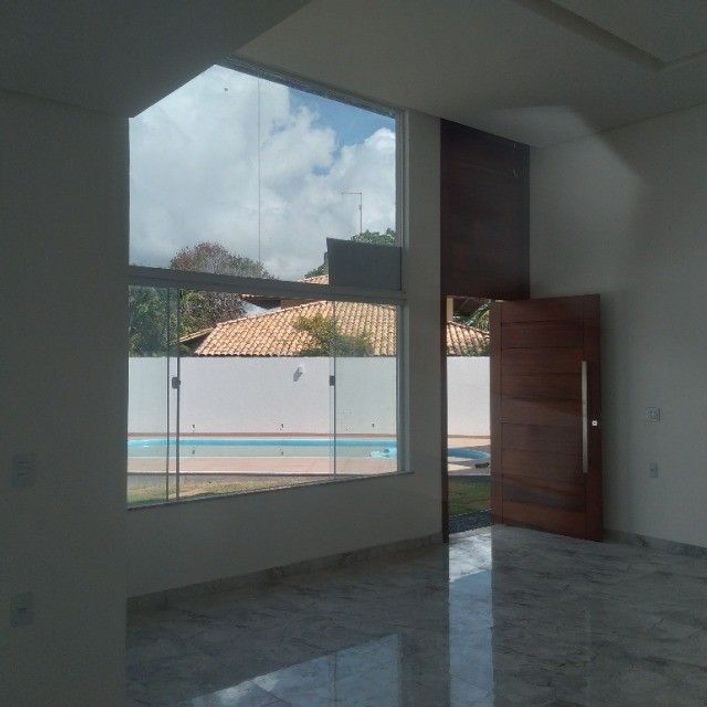 Casa com 4 dormitórios à venda, 290 m² por R$ 1.250.000,00 - Barra do Jacuípe - Camaçari/BA
