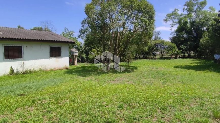 Terreno grande à venda com casa