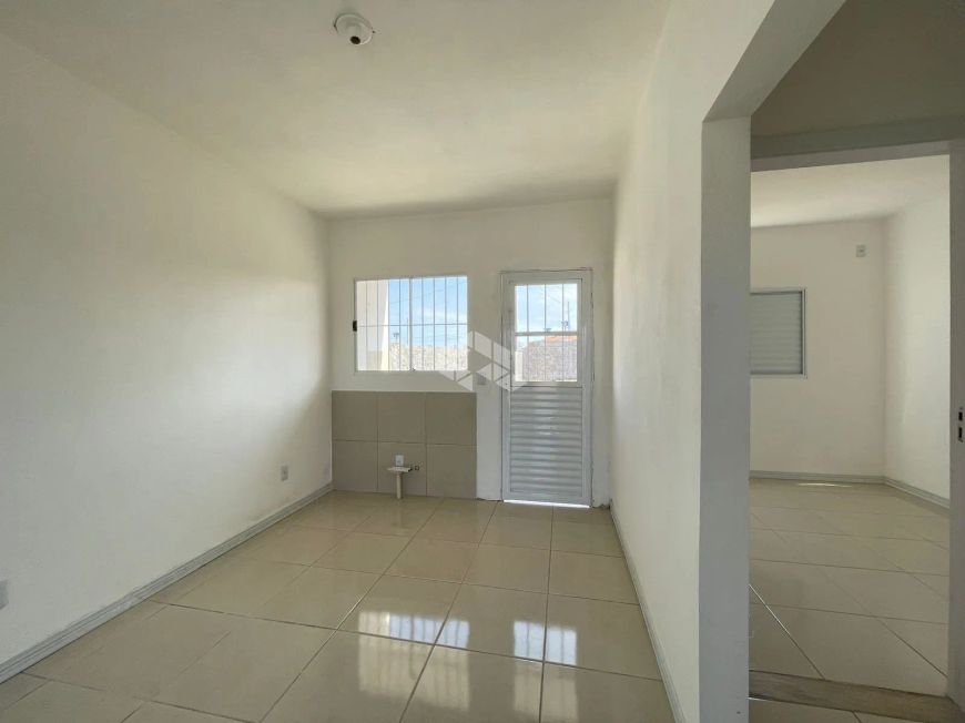 Casa à venda no bairro Diácono João Luiz Pozzobon em Santa Maria.