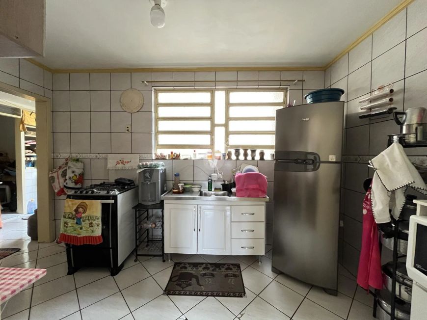 Amplo apartamento central de 3 dormitórios com suíte e box de garagem duplo