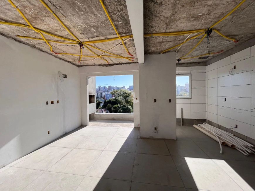 Apartamento 02 dormitórios com suíte e sacada com churrasqueira à venda na planta no Bairro Lourdes