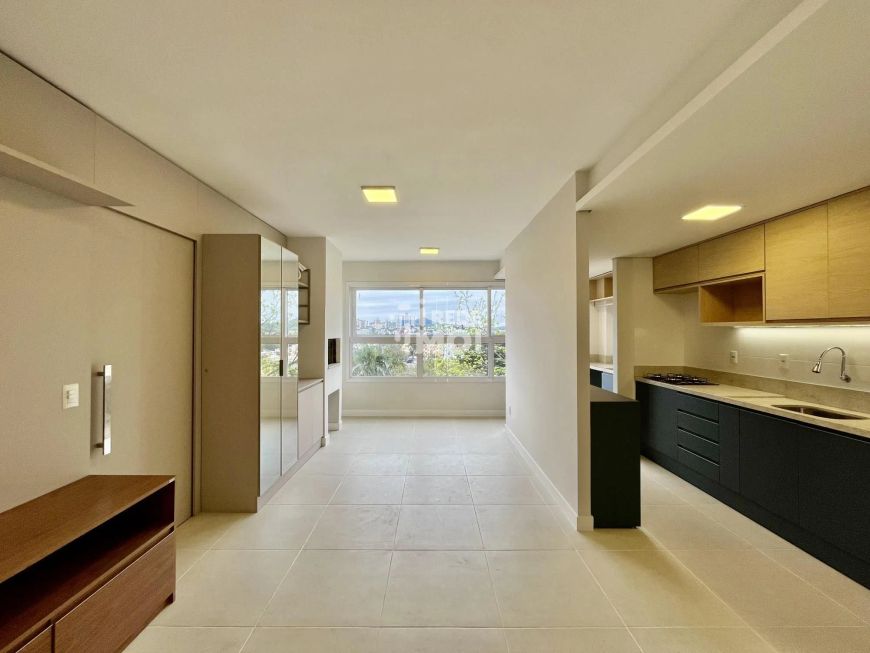 Apartamento com 02 dormitórios, suíte e garagem