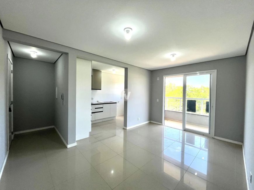 Apartamento 2 dormitórios com suíte, sacada, churrasqueira e garagem