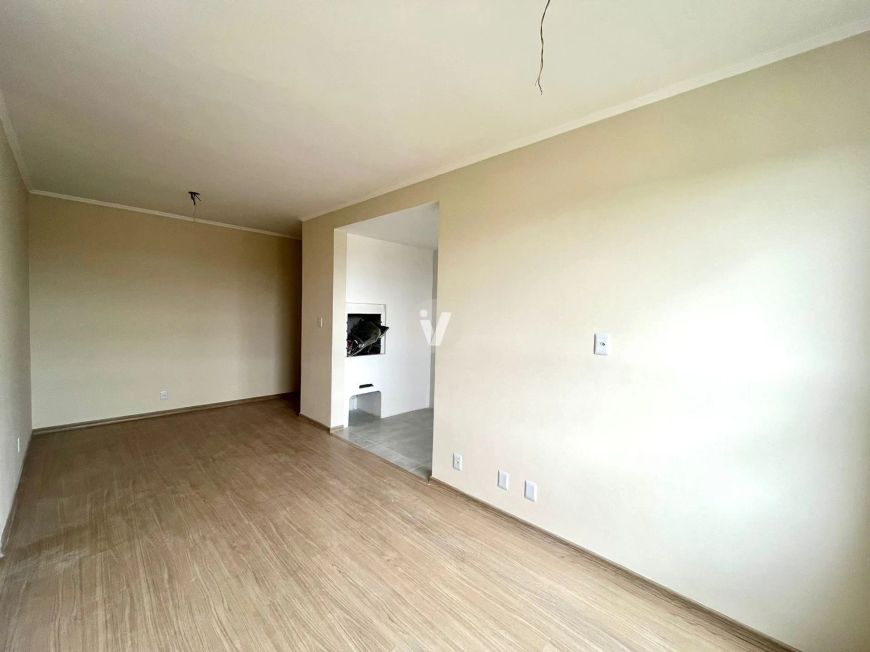 Apartamento de 2 dormitórios e com vaga de garagem.