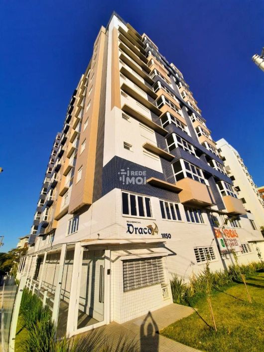Apartamento de 2 dormitórios, suíte, churrasqueira e 2 vagas de garagem no bairr