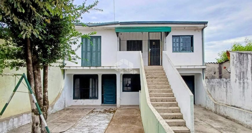 Casa a venda com 7 quartos, 5 dormitórios garagem para 2 carros no Bairro Juscelino Kubitschek