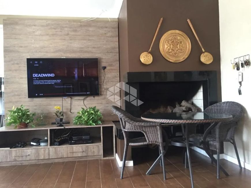 Casa de 3 dormitórios à venda com suíte no Bairro Tomazetti