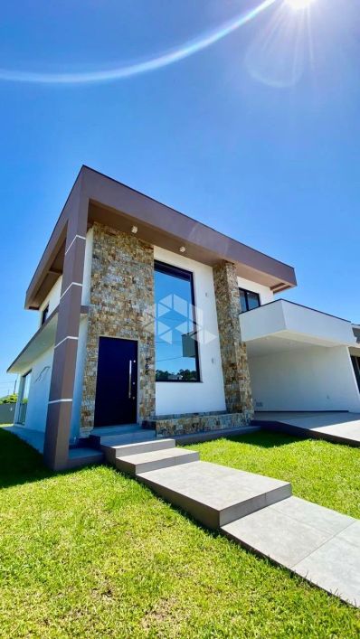 Casa em Condomínio Fechado à venda em Camobi com 3 suítes