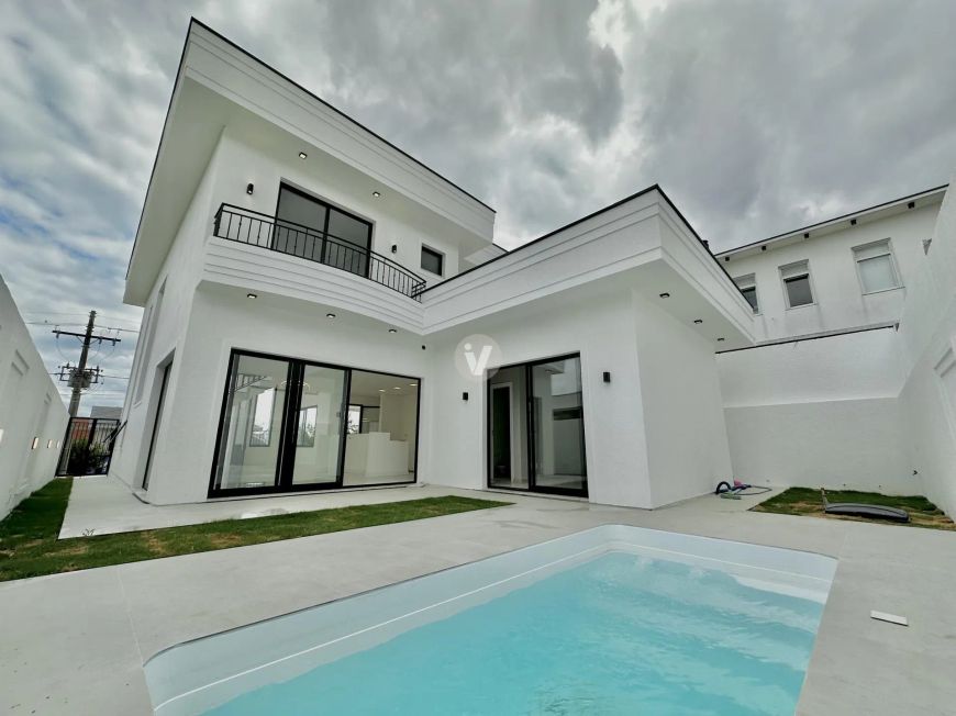 CASA NEOCLÁSSICA COM 3 SUÍTES E PISCINA NO REAL PARK