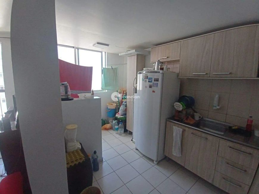 Apartamento no Bairro Dores: 2 dormitórios, sala, cozinha, banheiro box garagem.
