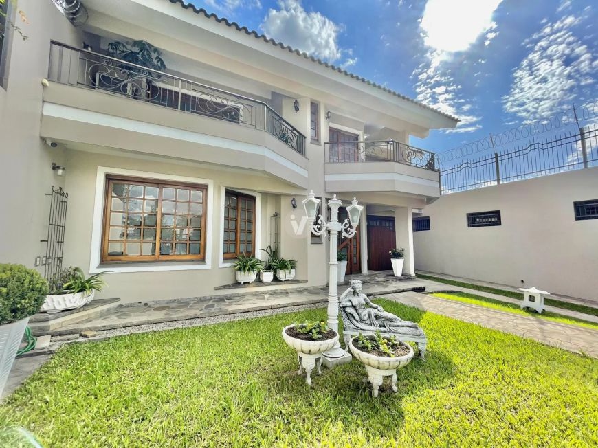 Exelente casa com 4 suítes e 661m² de área privativa!
