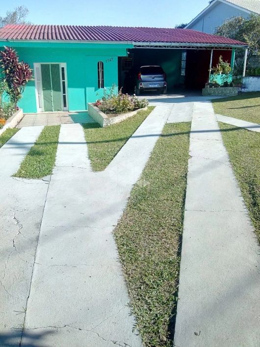Casa à venda no bairro Caturrita.