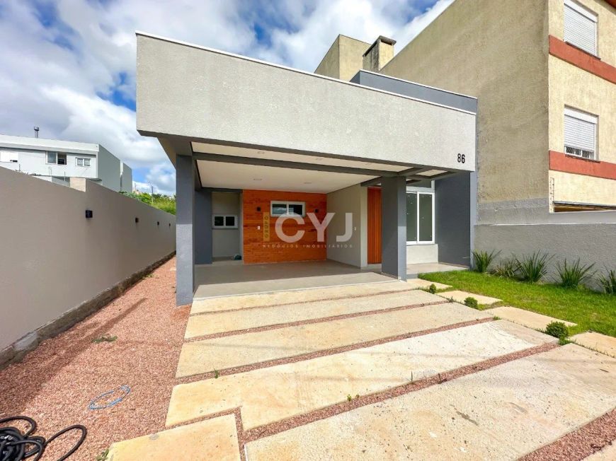 Casa 3 dormitórios no bairro Renascença em Gravataí