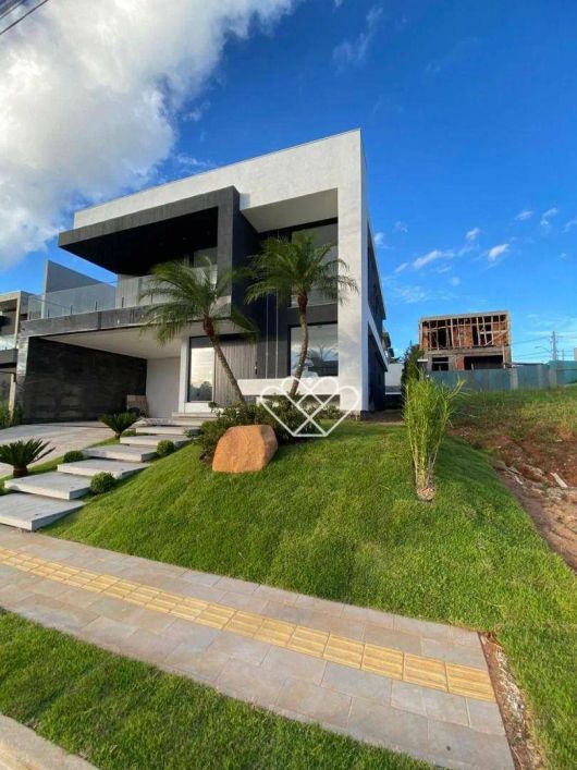 Casa de Alto Padrão no Condomínio Cyrela, Gravataí - Conforto, Segurança e Lazer para Sua Família!