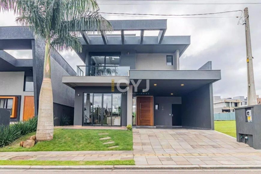Casa com 03 dormitórios em condomínio fechado localizado no centro de Gravataí