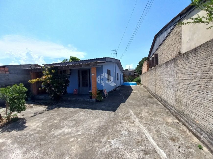 Casa 03 dormitórios para vender no bairro Monte Belo em Gravataí.