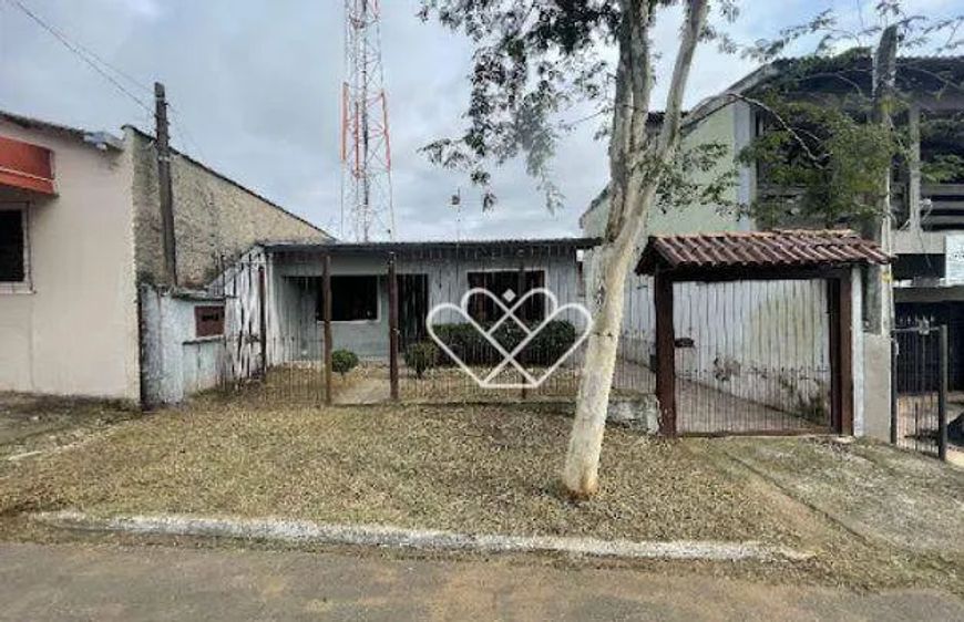 Casa Espaçosa com Quintal no Bairro Vera Cruz – 2 Dormitórios e 3 Vagas Cobertas