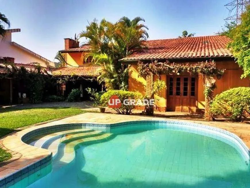 Casa com 4 dormitórios à venda, 660 m² por R$ 7.100.000,00 - Alphaville Residencial Um - Barueri/SP