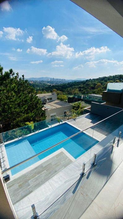 Casa em condomínio fechado, com 4 suítes, piscina, 7 vagas à venda, 578 m² por R$ 10.450.000 - Barue