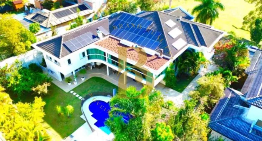 Casa de condomínio com 744 m², 4 quartos sendo 4 suítes à venda no bairro Alphaville.