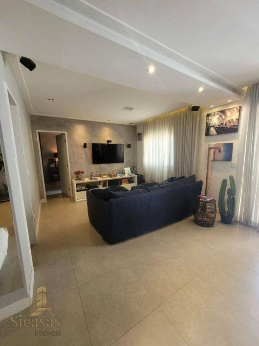 Apartamento mobiliado à venda no Jardim Tupanci em Barueri com 2 quartos sendo 1 suíte e 1 vaga por