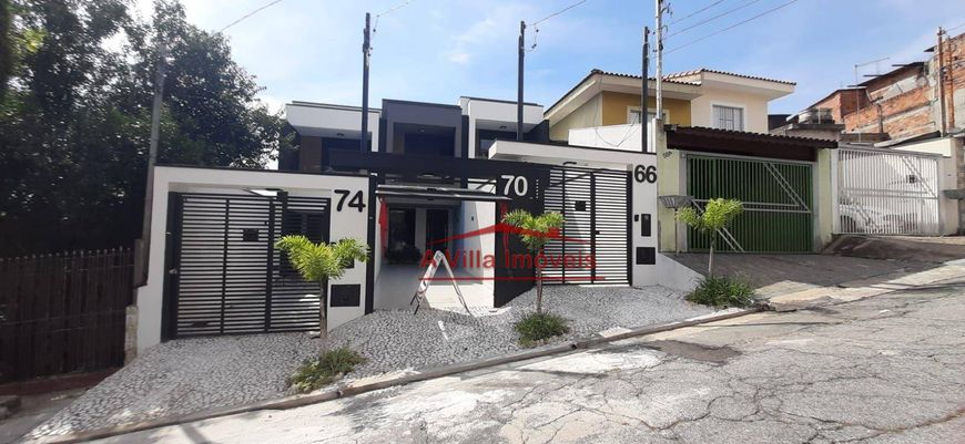 Sobrado com 2 suítes e 2 vagas - Vila Ré