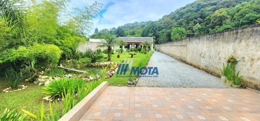 Chácara à venda Colombo, Casa sede com área 180,00m2, tanque rio, frente para asfalto, 3.239,60m2
