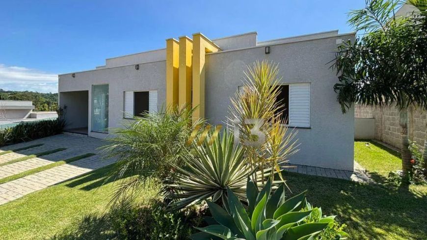 Casa com 3 suítes à venda, 1000 m² de terreno e 382 m² construção por R$ 1.550.000 - Condomínio Terr