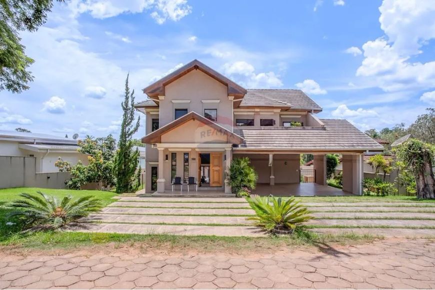 Casa estilo Americano com 5 dormitórios, 4 suítes à venda, 402 m² por R$ 1.950.000 - Condomínio Pala
