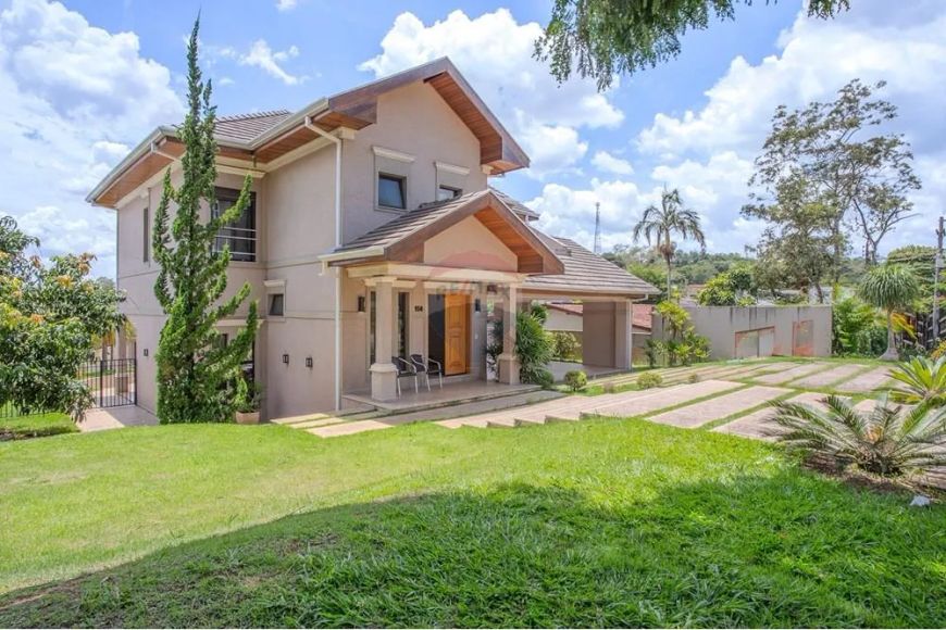 Casa estilo Americano com 5 dormitórios, 4 suítes à venda, 402 m² por R$ 1.950.000 - Condomínio Pala