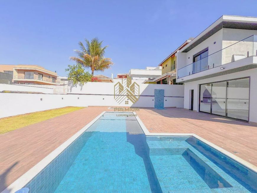 Casa de condomínio com 04 suites, fire pit, piscina por R$3.600.000