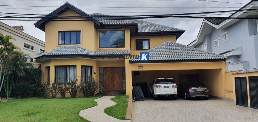 Sobrado em Condomínio p/ VENDA - 4 suítes c/ Varanda, 6 Vagas, Piscina privativa Aquecida - Condomín