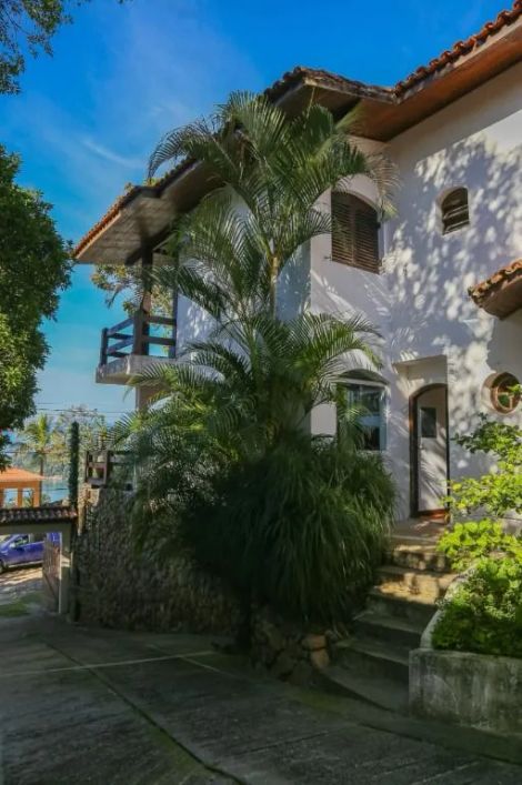 Casa com 4 dormitórios à venda, 290 m² por R$ 1.370.000,00 - Massaguaçu - Caraguatatuba/SP