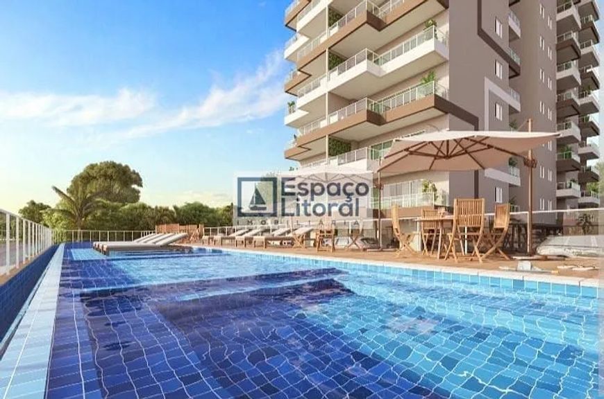 Apartamento com 2 dormitórios à venda, 58 m² por R$ 585.700,00 - Massaguaçu - Caraguatatuba/SP