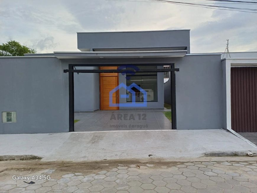 Casa à venda no bairro do Massaguaçu em Caraguatatuba, SP - Imóvel excepcional a apenas 800m da pra