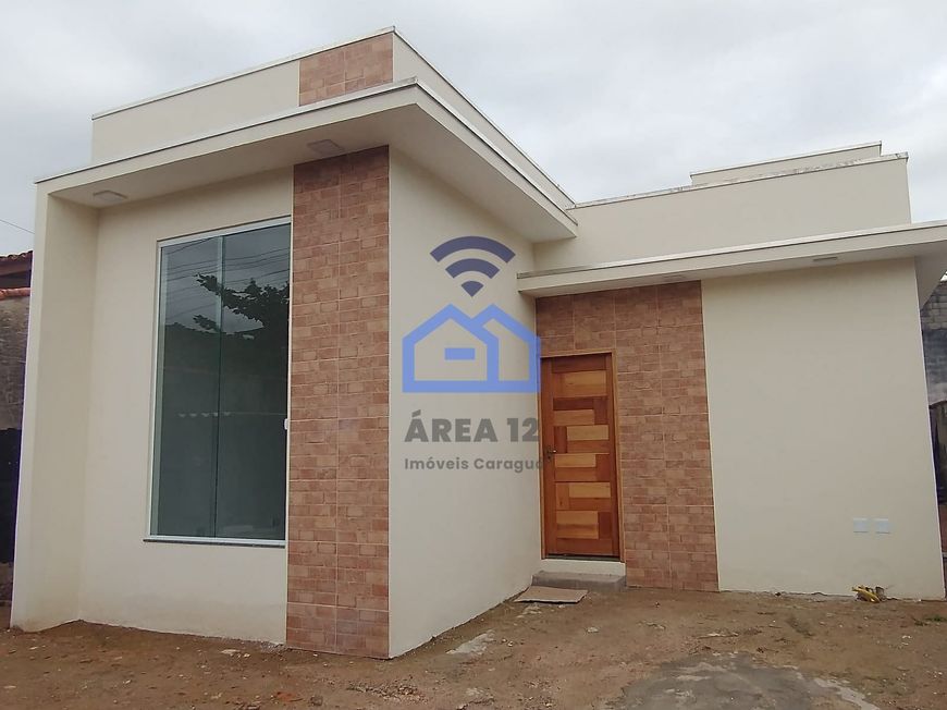 Casa à venda, Martim de Sá com 3 dormitórios, sendo uma suíte, banheiro, sala e lavanderia - Caragu