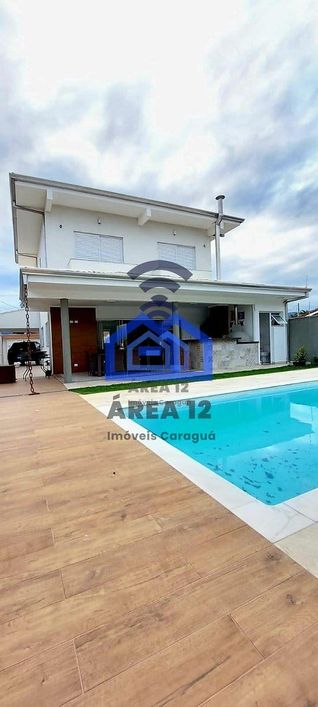 Linda casa à venda no Jardim Britânia - 4 dormitórios, sendo 2 suítes, banheiro, sala com 2 ambient