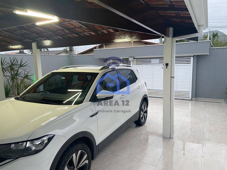 Casa à venda no bairro Getuba em Caraguatatuba, SP - 2 dormitórios, garagem, quintal, a 300 m da ro