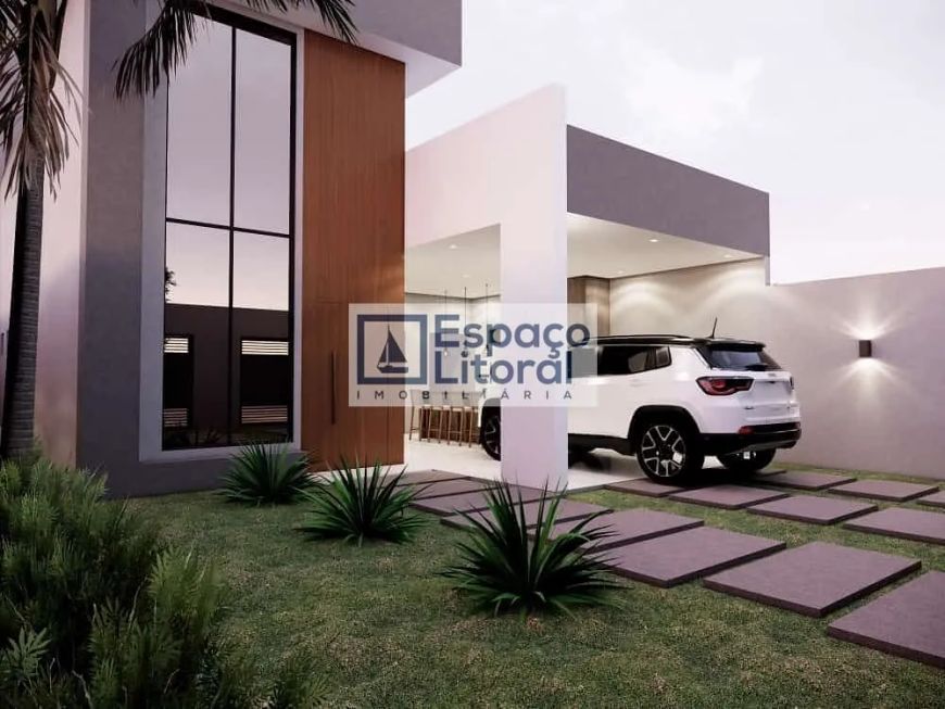 Casa com 3 dormitórios à venda, 119 m² por R$ 950.000,00 - Massaguaçu - Caraguatatuba/SP