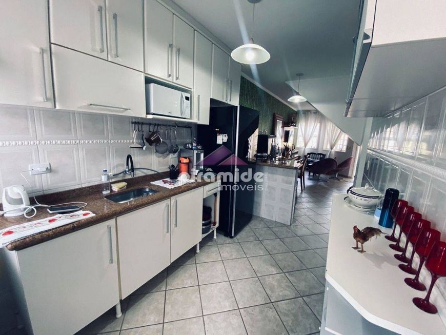 Casa com 2 dormitórios à venda, 80 m² por R$ 490.000 - Martim de Sá - Caraguatatuba/SP