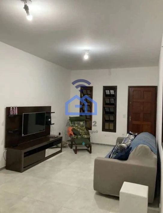 Casa com piscina à venda no bairro Cidade Jardim em Caraguatatuba, SP - Viva com conforto e comodid