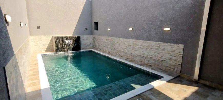 CASA LADO PRAIA COM PISCINA EM ITANHAÉM-SP LOCALIZADA NO BAIRRO SUARÃO