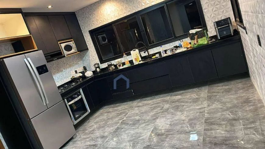 Sobrado com 5 dormitórios à venda, 435 m² por R$ 2.500.000,00 - Condomínio Terras de Santa Mariana -