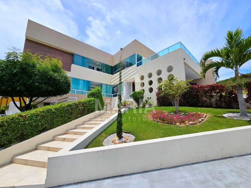 Casa em condomínio fechado com 5 quartos e piscina privativa à venda!